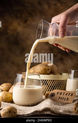 Potato milk alternative non dairy drink in glass Stock Photo