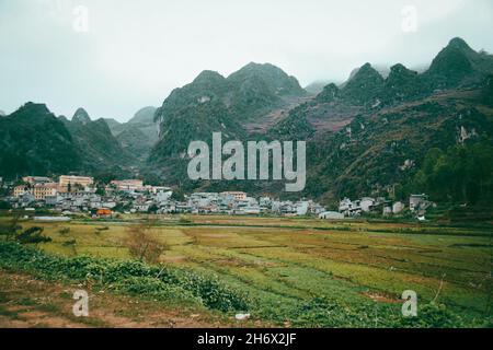 Scenic view of the foggy karst mountains in the rural district of Bac Son in Lang Son Province in Vietnam Stock Photo