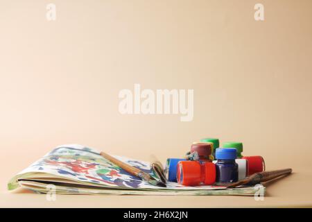 paint brush and art paper on color background  Stock Photo