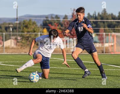 Soccer action with Bonners Ferry vs CDA Charter High School in Post Falls, Idaho. Stock Photo