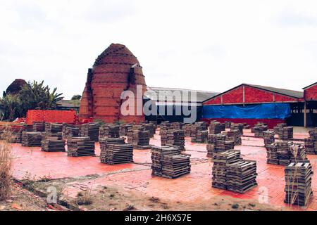 The famous centenarian traditional kilns for manufacturing handmade bricks in Vinh Long Province of Mekong Delta, Vietnam Stock Photo