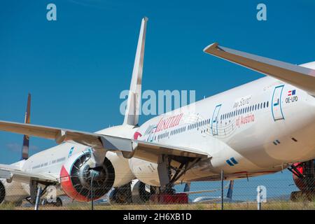 Caude, Teruel, Spain. 13th July, 2021 - Teruel Aerodrome the largest aircraft maintenance, storage and recycling center in Europe. Austrian airlines Stock Photo