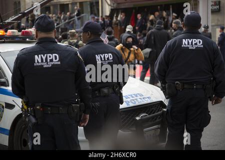2021 Veterans Day Parade along 5th Avenue. New York City hosts the largest Veterans Day  Parade in the country.  NYPD officers on duty at the parade. Stock Photo