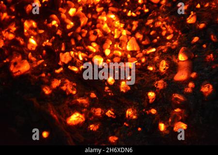 Hot coals from a fire Stock Photo