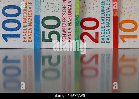 Here are four of six new Swiss banknotes of various denominations. These new banknotes are the eighth series of banknotes which were introduced betwee Stock Photo