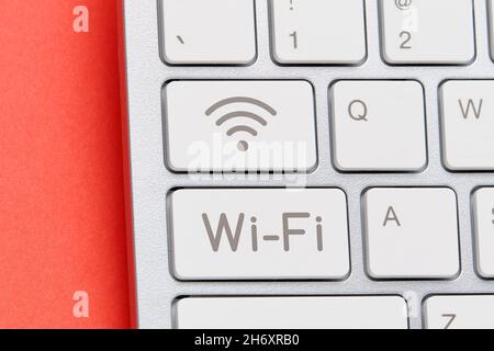 Wi-Fi network connection concept. Keyboard with network icon. Stock Photo