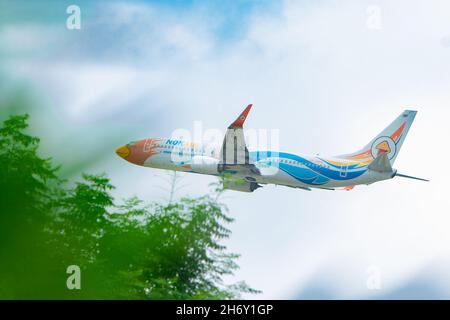 Thailand, Ching May, August 14, 2018, takes off from Chiang Mai airport Airplane in the blue sky with clouds. Stock Photo