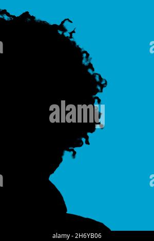 Silhouette of a black woman with an afro hairstyle Stock Photo