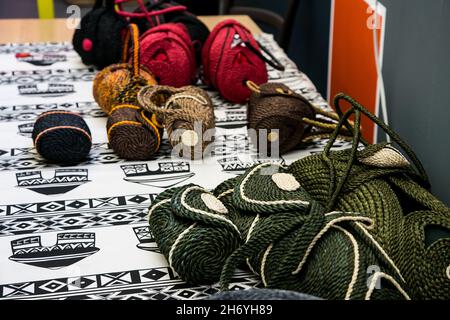 JOHANNESBURG, SOUTH AFRICA - Oct 19, 2021: A colorful bags on display at exhibitor at hand-made design fair in Johannesburg, South Africa Stock Photo