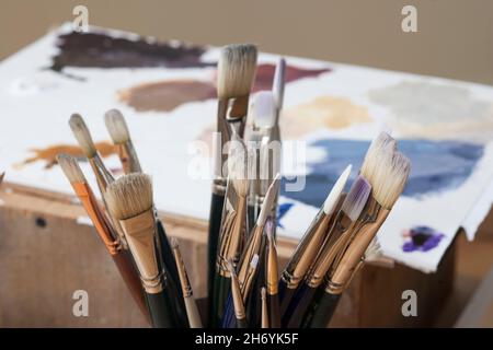 Artist's collection of paintbrushes Stock Photo