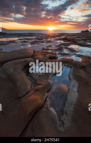 sunrise over the rocks at terrigal on the nsw central coast Stock Photo