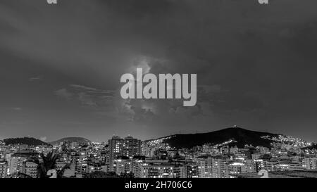 Arrival of a strong storm with lightning and rain. These weather conditions are typical of the Brazilian summer. Stock Photo