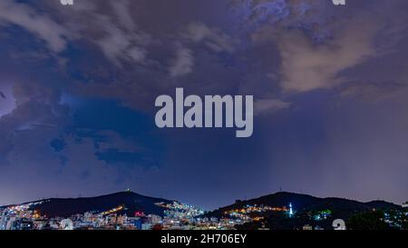 Arrival of a strong storm with lightning and rain. These weather conditions are typical of the Brazilian summer. Stock Photo