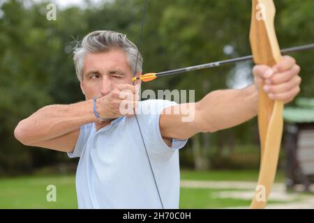 a man practicing the archery Stock Photo