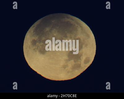 Minster on Sea, Kent, UK. 19th Nov, 2021. UK Weather: the partial eclipse of the full Beaver Moon seen from Minster on Sea in Kent this morning. Credit: James Bell/Ģ����ý Live News Stock Photo