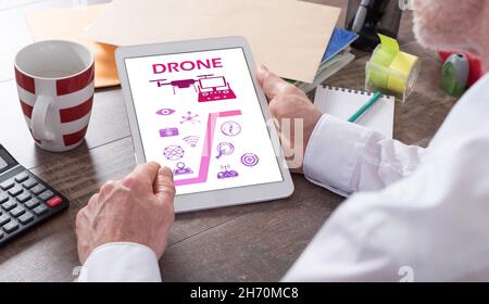 Drone concept shown on a tablet held by a man Stock Photo
