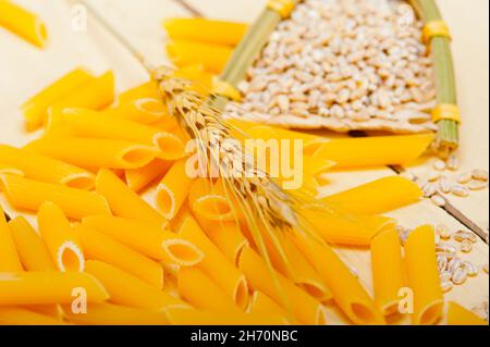 short Italian pasta penne with durum wheat grains Stock Photo