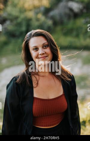 Portrait of smiling young woman Stock Photo