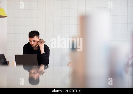 Young man at job center Stock Photo