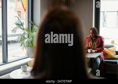 Woman having coffee break Stock Photo