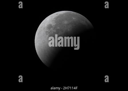 Washington, United States. 19th Nov, 2021. The Earth casts its shadow on a partial lunar eclipse over the skies of Washington, DC on Friday, November 19, 2021. The partial eclipse is the longest since the year 1440. A lunar eclipse occurs when the Sun, Earth and Moon line up in space, with the Earth's shadow gliding over the moon. Photo by Pat Benic Credit: UPI/Ģ����ý Live News Stock Photo