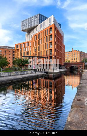 Smart, modern apartment complex Burlington House, part of a regeneration of Manchester's Northern Quarter. Alongside the Rochdale Canal in Manchester. Stock Photo