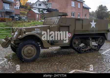 Stavelot, Belgium - November 2, 2021: American Halftrack Monument, complete with machine gun. Liege Province. Autumn rainy day. Selective focus. Stock Photo