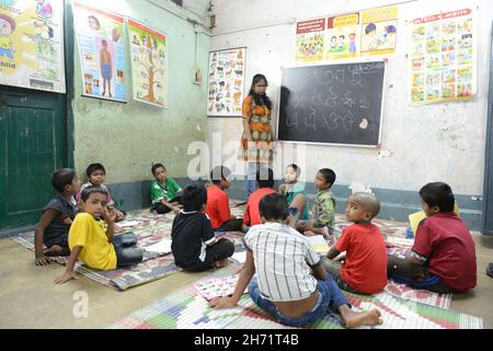 Classroom education, counselling support and first aid techniques provided to street kids. Kolkata, India. Stock Photo