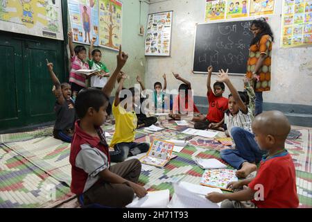 Classroom education, counselling support and first aid techniques provided to street kids. Kolkata, India. Stock Photo