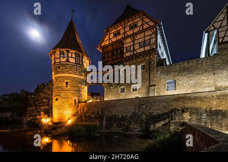 Night shot of illuminated castle Zollernschloss Balingen with moon, Germany Stock Photo