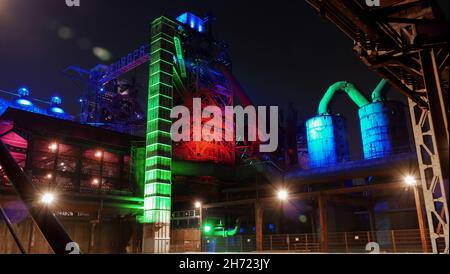 Old colorful illuminated steel factory in duisburg, germany Stock Photo