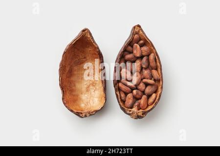 Halved pod of cocoa tree with seeds Stock Photo