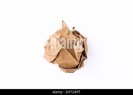 Crumpled paper ball. Isolated on white background. Concept for businnes, banner, web site and other. Vintage paper. Crumpled cardboard. Stock Photo