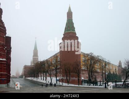 The corner Arsenalnaya tower of the Moscow Kremlin in the fog. Misty winter morning in Moscow. Stock Photo