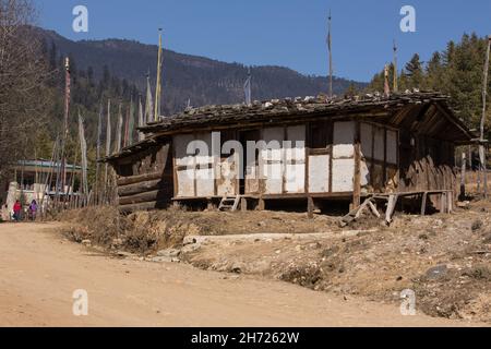 A dilapidated old traditional wattle and daub farmhouse in the village of Hongtsho, Bhutan. Stock Photo