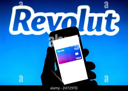 Spain. 16th Nov, 2021. In this photo illustration, a Revolut Visa Card is seen on a smartphone screen with a Revolut logo in the background. (Photo by Thiago Prudencio/SOPA Images/Sipa USA) Credit: Sipa USA/Alamy Live News Stock Photo