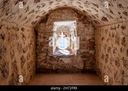 Niebla, Spain - November 18, 2021: View of defensive embrasures in the walls of Niebla castle, in Huelva, Andalucia, Spain Stock Photo