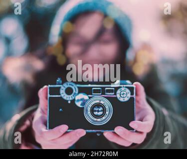 Woman holding a vintage camera, Oregon Stock Photo