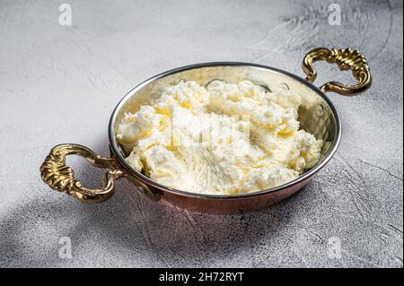 Turkish Kaymak Clotted cream, butter cream. Gray background. Top view Stock Photo