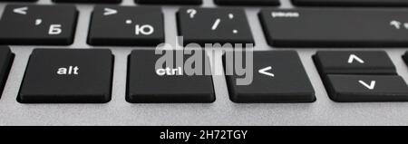 Part of the keyboard from the laptop buttons, close-up angle view Stock Photo