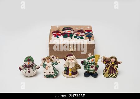 Miniature Christmas decorations with a closed storage box. Stock Photo