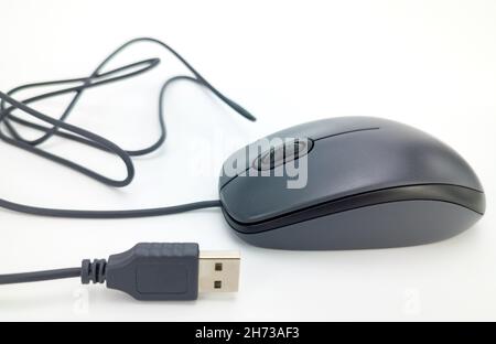 computer mouse on a white background. selective focus. USB connection Stock Photo