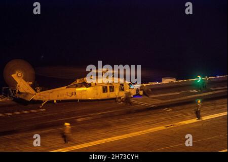 211118-N-RO680-2021 PHILIPPINE SEA (Nov. 18, 2021) A naval aviator ...