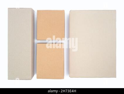 Cardboard boxes on a white background. Flat lay geometry Stock Photo