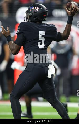Las Vegas, USA. 19th Nov, 2021. November 19, 2021: UNLV Rebels quarterback Justin Rogers (5) throws the football during the NCAA football game featuring the San Diego State Aztecs and the UNLV Rebels at Allegiant Stadium in Las Vegas, NV. The San Diego State Aztecs lead the UNLV Rebels at halftime 21 to 10. Christopher Trim/CSM Credit: Cal Sport Media/Alamy Live News