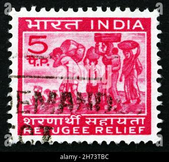 INDIA - CIRCA 1971: a stamp printed in India shows Refugees from East Pakistan, circa 1971 Stock Photo