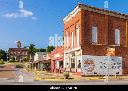 Elizabethtown, Illinois, USA - August 24, 2021: The old business district on Main Street with the Hardin County Courthouse in the background Stock Photo