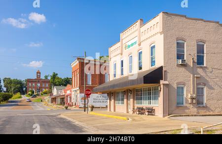 Elizabethtown, Illinois, USA - August 24, 2021: The old business district on Main Street with the Hardin County Courthouse in the background Stock Photo