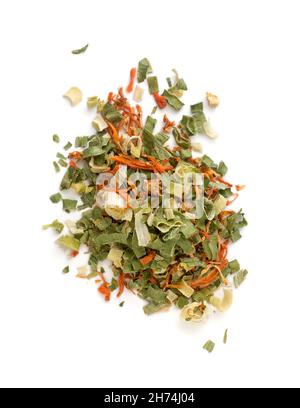 pile of dehydrated vegetables, food seasoning on white background, top view closeup Stock Photo