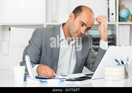 Male having lot of work and problems Stock Photo